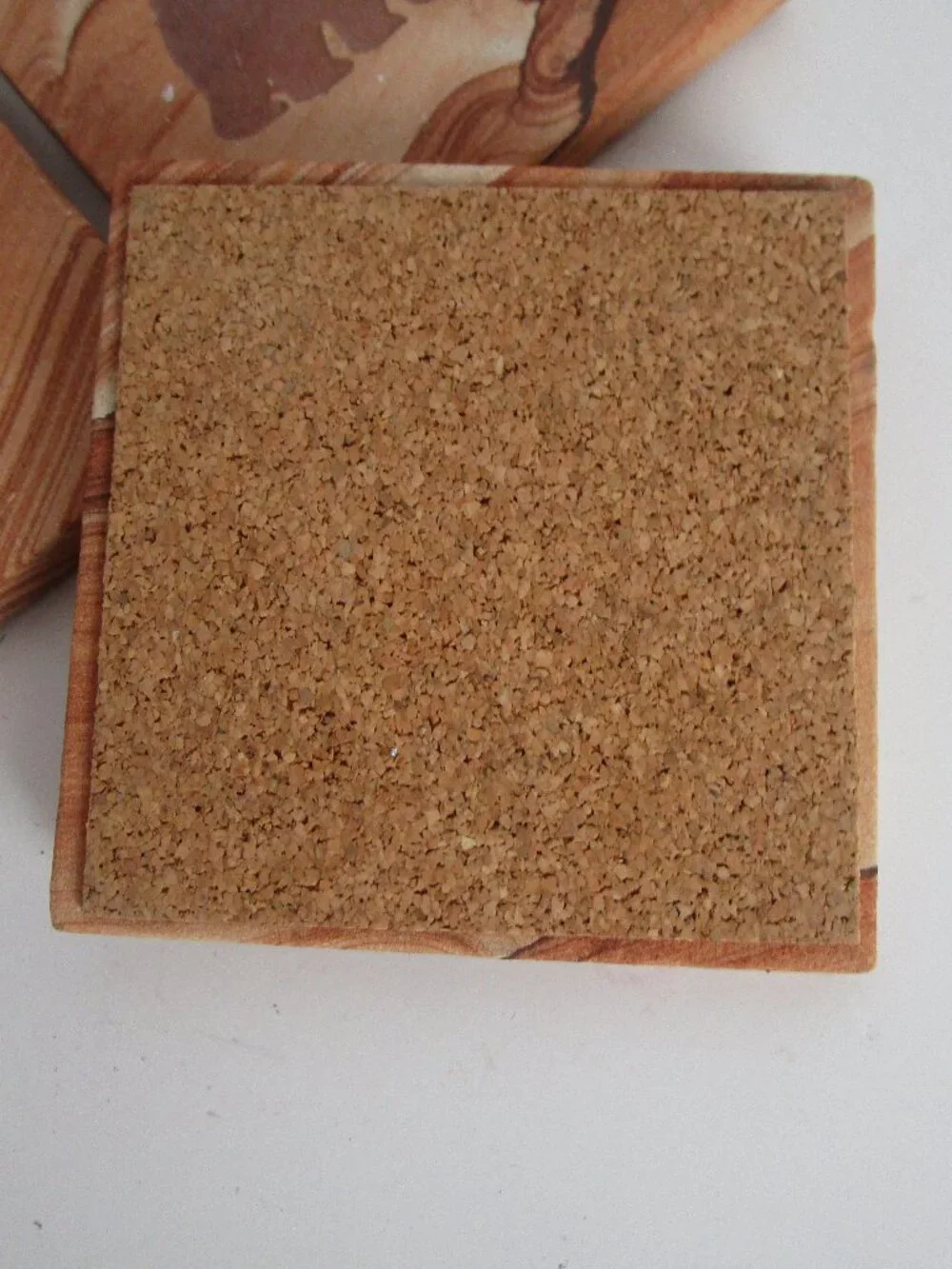 etched sandstone coaster set